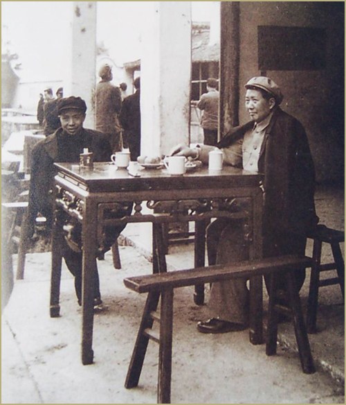 Historical meeting photograph from the source document